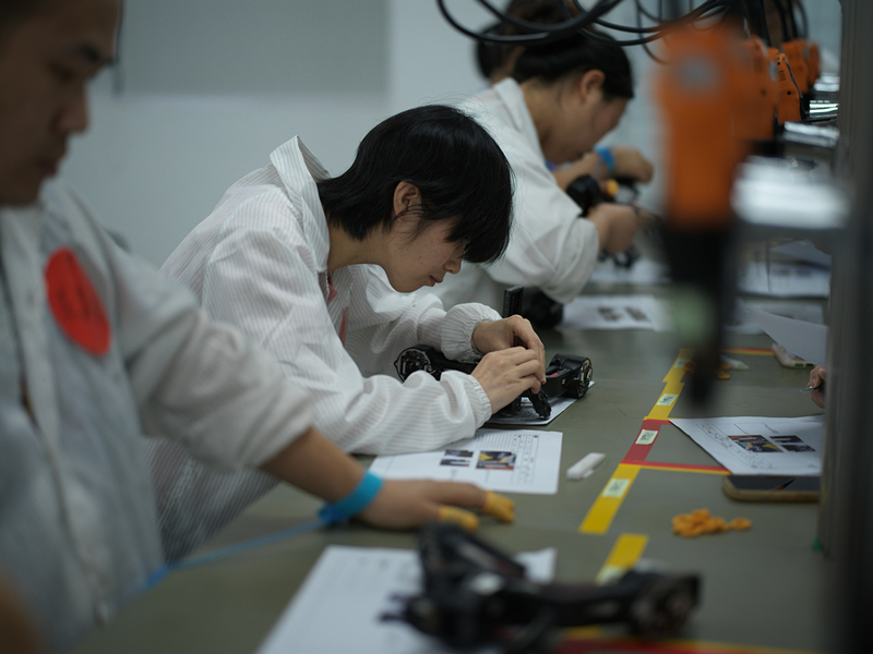 On April 25, 2024, employees of a factory in Shenzhen are working.